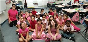 Staff and students wear pink to raise awareness for breast cancer. 
