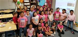 Staff and students wear pink to raise awareness for breast cancer. 