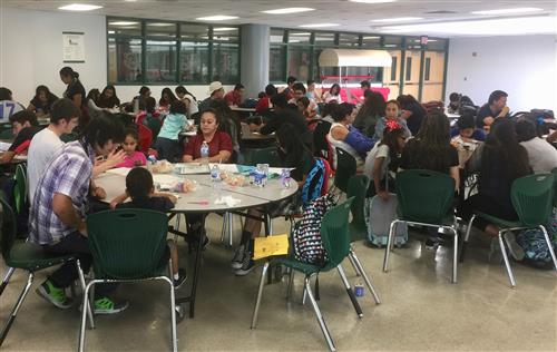 Parents and students at Lion Cubs Tutoring in the Alhambra High School Cafeteria 