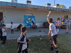 Having a blast at fall festival. 