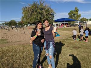 Having a blast at fall festival. 