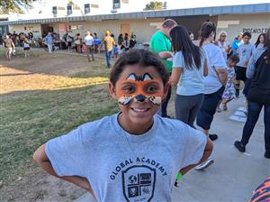 Having a blast at fall festival. 