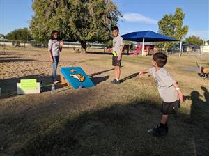 Having a blast at fall festival. 